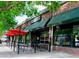 Neighbors restaurant exterior with outdoor seating, stylish signage, and inviting ambiance at 2950 Hudson St, Denver, CO 80207