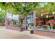 Charming storefront with large display windows showcasing unique merchandise and colorful flowers outside at 2950 Hudson St, Denver, CO 80207