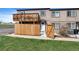 Townhome exterior showing a wood fence and a covered balcony at 7700 W Glasgow Pl # 11C, Littleton, CO 80128