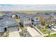 Wide aerial view of the home with mature landscaping in an attractive neighborhood at 3888 Grand Baker St, Aurora, CO 80019