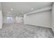 Spacious finished basement with recessed lighting, neutral walls, and large carpeted area at 3888 Grand Baker St, Aurora, CO 80019