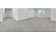Finished basement offering ample space, neutral color palette, and modern carpeting at 3888 Grand Baker St, Aurora, CO 80019