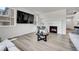 Comfortable living room with a fireplace, mounted TV, and open layout for relaxing and entertaining at 3888 Grand Baker St, Aurora, CO 80019
