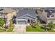 Beautiful aerial view of the home showcasing a spacious yard and neighborhood at 14066 Ivanhoe Ct, Thornton, CO 80602