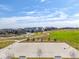 Community basketball court with well-maintained surface, hoops, and neighborhood views at 14066 Ivanhoe Ct, Thornton, CO 80602
