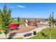 Community playground with slide, swings, and climbing structures for outdoor fun and recreation at 14066 Ivanhoe Ct, Thornton, CO 80602