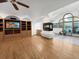This living room features a fireplace, built-in cabinets, and hardwood floors at 7217 S Zephyr Way, Littleton, CO 80128