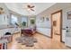 Charming bedroom with wood accents, telescope, and attached bathroom access provides lots of natural light at 5275 Pinyon Jay Rd, Parker, CO 80134