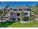 Large home showcases multiple outdoor living spaces with patios and decks, blending indoor/outdoor living at 5275 Pinyon Jay Rd, Parker, CO 80134