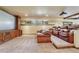 Inviting home theater features tiered seating, plush leather recliners, and a large projector screen at 5275 Pinyon Jay Rd, Parker, CO 80134