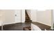Basement area featuring stairs and dark concrete floors at 650 Kearney St, Denver, CO 80220