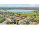 Stunning aerial view of houses in a quiet neighborhood adjacent to Sloan's Lake at 3818 W 25Th Ave, Denver, CO 80211