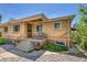 This lovely brick home features a cozy front porch and meticulous landscaping at 3818 W 25Th Ave, Denver, CO 80211