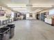 Spacious garage with built-in shelving and ample workspace, perfect for storage and projects at 1941 E 119Th Pl, Northglenn, CO 80233