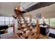 Open staircase leading to a dining area with floor to ceiling windows and a view at 1150 Madge Gulch Rd, Sedalia, CO 80135