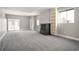 Finished basement featuring a fireplace, built-in shelving, and ample space at 10786 Bear Cub Dr, Broomfield, CO 80021