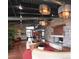 Spacious lobby area with comfortable seating, stone walls, and modern lighting fixtures at 10786 Bear Cub Dr, Broomfield, CO 80021