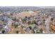 Aerial view of the neighborhood surrounded by mature trees and easy access parking at 4899 S Dudley St # 18A, Littleton, CO 80123