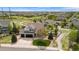 Aerial view of a home featuring a spacious front yard, trampoline, and two-car garage at 688 Cinnabar Ln, Castle Rock, CO 80108