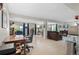 Finished basement with tile floors, office space, sitting area, and a TV at 688 Cinnabar Ln, Castle Rock, CO 80108