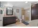 Well-lit bathroom features a vanity, shower, and toilet with modern fixtures and neutral decor at 688 Cinnabar Ln, Castle Rock, CO 80108