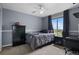 Bedroom featuring neutral carpeting, a ceiling fan, and a window with a view at 688 Cinnabar Ln, Castle Rock, CO 80108