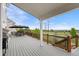 Exterior view of a deck area with a grill and an outdoor dining set under a covered area at 688 Cinnabar Ln, Castle Rock, CO 80108