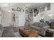 Bright living room with a staircase and views of the dining area at 688 Cinnabar Ln, Castle Rock, CO 80108