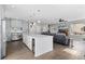 Living room and kitchen combo create a large and accessible living space at 688 Cinnabar Ln, Castle Rock, CO 80108