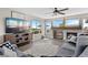 Living room has great natural light and a gas fireplace at 688 Cinnabar Ln, Castle Rock, CO 80108