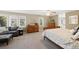 Primary bedroom with large windows providing an abundance of natural light at 85 Willowleaf Dr, Littleton, CO 80127