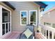 Exterior view of deck featuring lounge chair with a comfortable pillow at 85 Willowleaf Dr, Littleton, CO 80127
