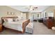 Spacious main bedroom featuring neutral tones and a comfortable seating area at 85 Willowleaf Dr, Littleton, CO 80127