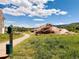 Scenic neighborhood view featuring walking path near Red Rocks Amphitheater, Colorado at 85 Willowleaf Dr, Littleton, CO 80127