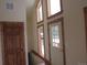 Entryway features wood trim and multiple windows at 10178 Hutch Ln, Conifer, CO 80433