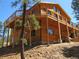 Stunning wood-clad home with a generous wrap-around deck, ideal for entertaining and enjoying the outdoors at 10178 Hutch Ln, Conifer, CO 80433
