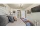 A comfortable bedroom showcasing a bed with decorative pillows, lighting, and artwork, creating a welcoming space at 924 Brookhurst Ave # C, Highlands Ranch, CO 80129