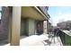 Inviting covered front porch with railing and comfortable seating at 924 Brookhurst Ave # C, Highlands Ranch, CO 80129