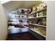 Walk-in pantry featuring ample shelving for food storage at 924 Brookhurst Ave # C, Highlands Ranch, CO 80129
