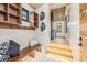 Charming entryway with ample storage, seating, and sleek design at 224 S Ridge St, Breckenridge, CO 80424