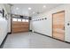 Spacious garage with epoxy floor and modern accents at 224 S Ridge St, Breckenridge, CO 80424