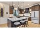 Bright kitchen with a large island, white countertops, stainless steel appliances, and pendant lighting at 224 S Ridge St, Breckenridge, CO 80424