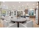 Open floor plan featuring a modern kitchen, dining area, and living room with ample natural light at 224 S Ridge St, Breckenridge, CO 80424