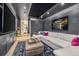 Cozy theater room features a large TV, comfy seating, starry ceiling, and ambient lighting for the perfect movie night experience at 224 S Ridge St, Breckenridge, CO 80424