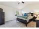 Serene bedroom with neutral tones, a vaulted ceiling, and a comfortable bed at 7641 Lebrun Ct, Lone Tree, CO 80124