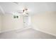 Unfurnished bedroom with neutral carpet, fresh paint and trim at 6512 Upham St, Arvada, CO 80003