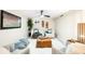 Inviting living room with comfortable seating, neutral colors, and stylish decor at 6512 Upham St, Arvada, CO 80003