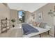 Bedroom with vaulted ceilings, large windows, and natural light at 1354 Carlyle Park Cir, Highlands Ranch, CO 80129