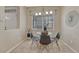 Cozy dining area with a round table and modern pendant lighting at 1354 Carlyle Park Cir, Highlands Ranch, CO 80129