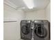 Convenient laundry room in the basement with two sets of washer/dryer at 3267 Stuart St, Denver, CO 80212